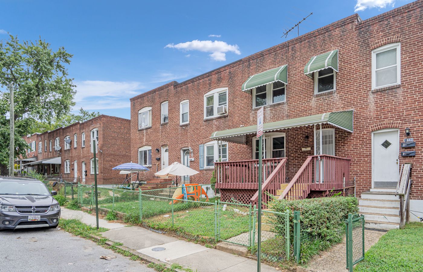 Brick rowhomes with front porches